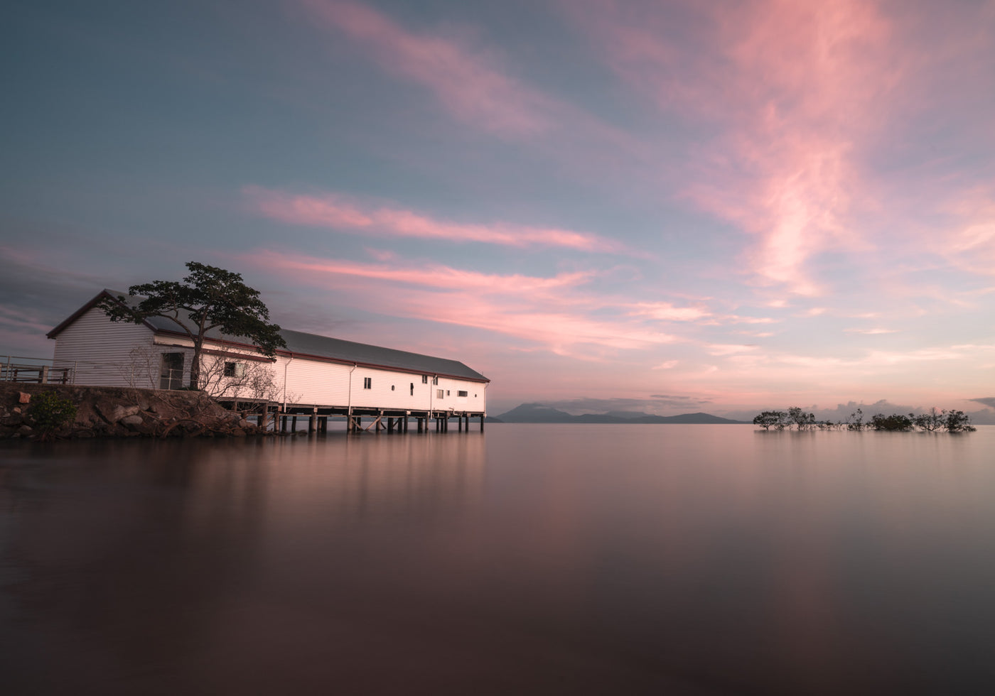 australian landscape sunrise over sugar wharf with blue and magenta skies